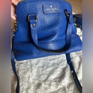 Kate spade blue purse with handles and over the shoulder strap. Well loved